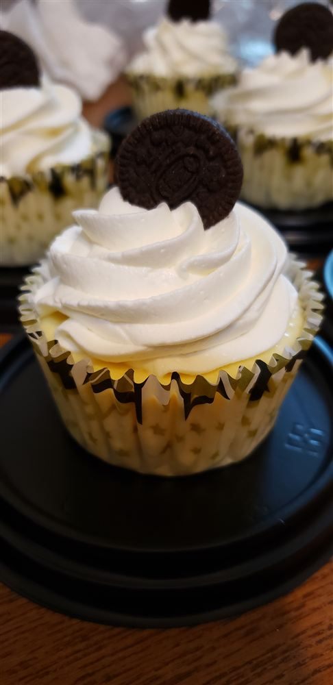 Vanilla cupcake with a cream swirl